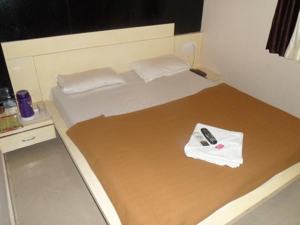 Hotel Canada Palace Watuwa Стая снимка