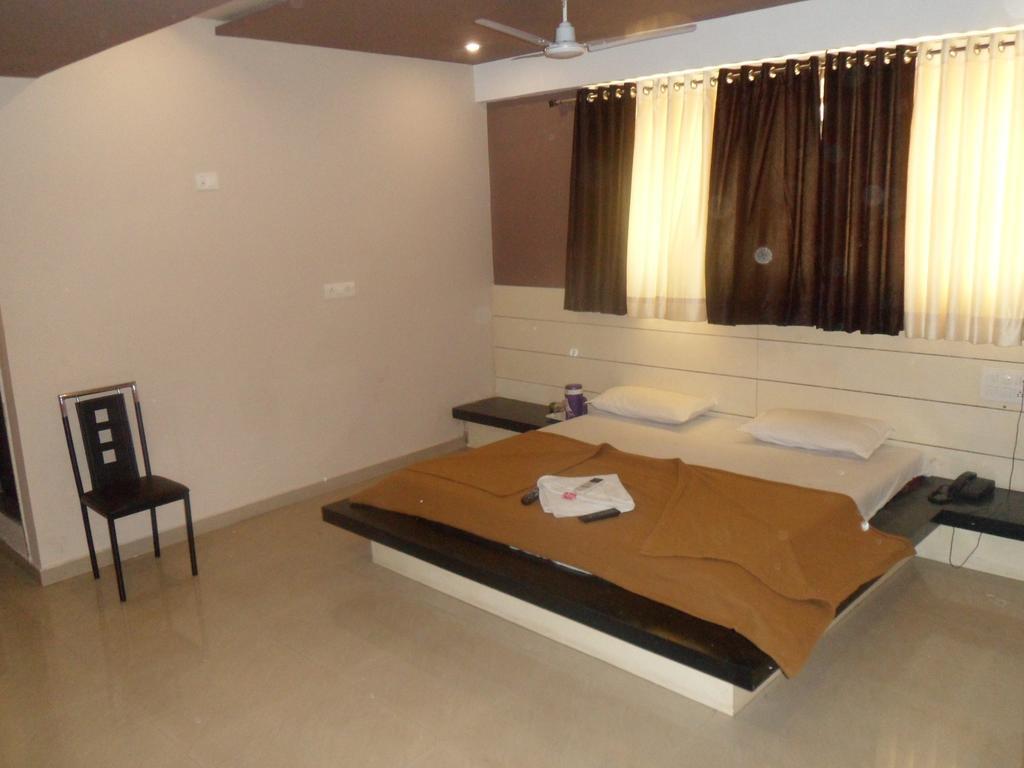 Hotel Canada Palace Watuwa Стая снимка